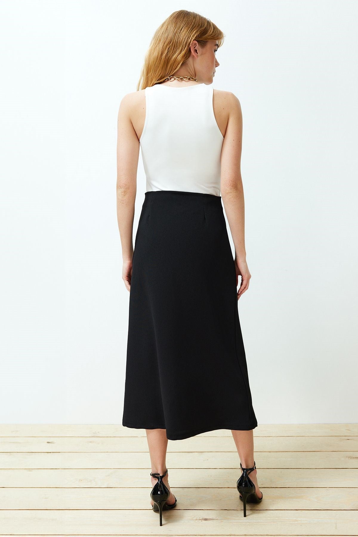 Black Asymmetric Buttoned Slit Knit Skirt Twoss24et00143