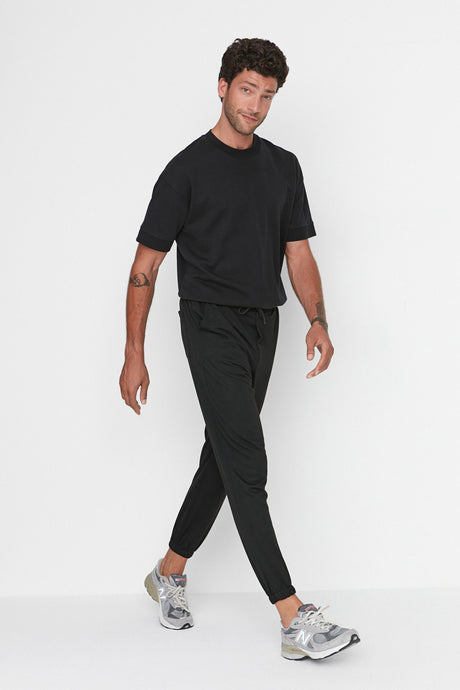 Black Men's Basic Oversize Fit Sweatpants Sweatpants Tmnaw22ea0160